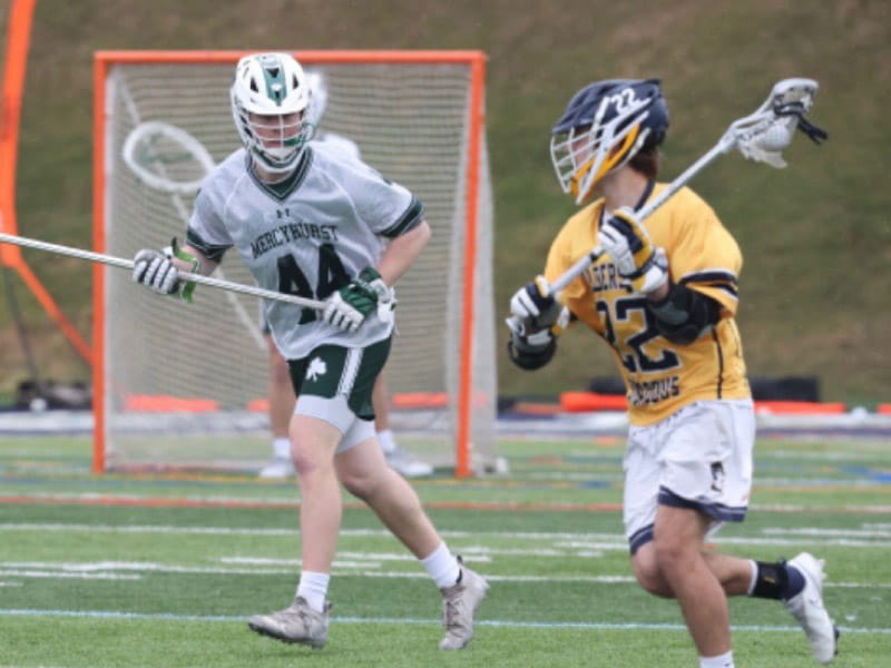 Heart transplant recipient Ryan Scoble (left) playing in a lacrosse game for Mercyhurst University. (Photo courtesy of the Scoble family)