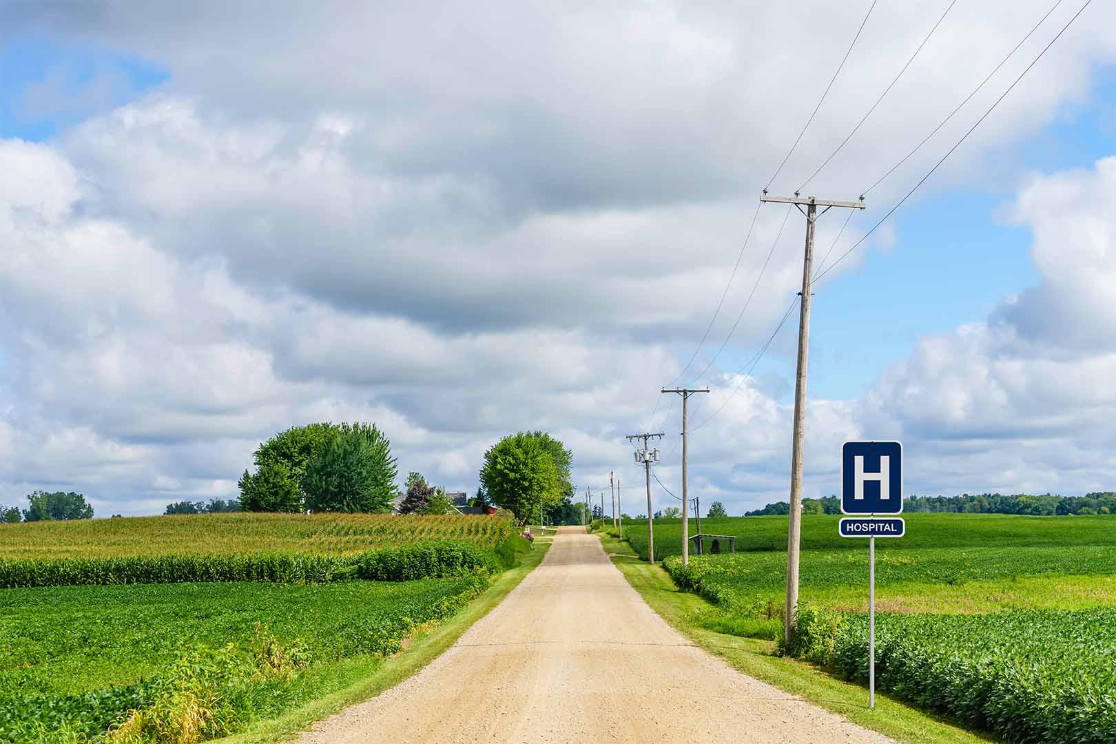 Image of a country road with road sign saying 