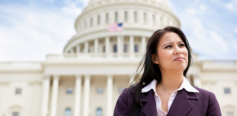 woman standing in front of united state capitol building